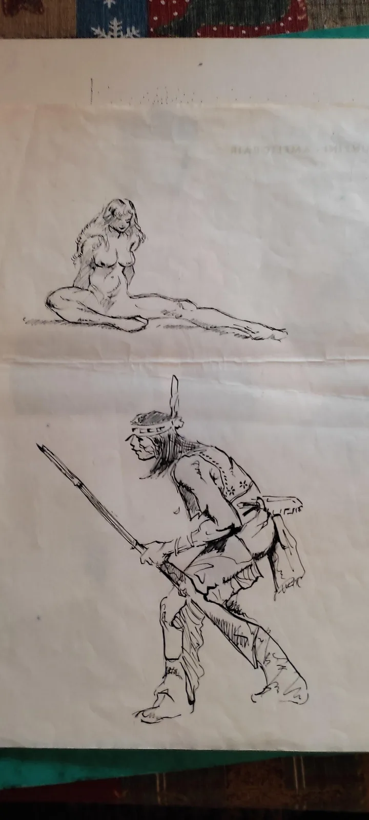 The image shows two pencil sketches on paper. The top sketch is of a nude woman sitting in a relaxed pose. The bottom sketch…