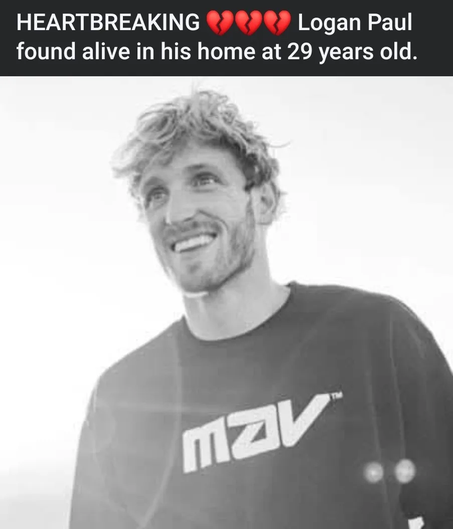 A black and white photo of Logan Paul smiling while wearing a dark t-shirt with 'mzv' printed on it. The image is overlaid…