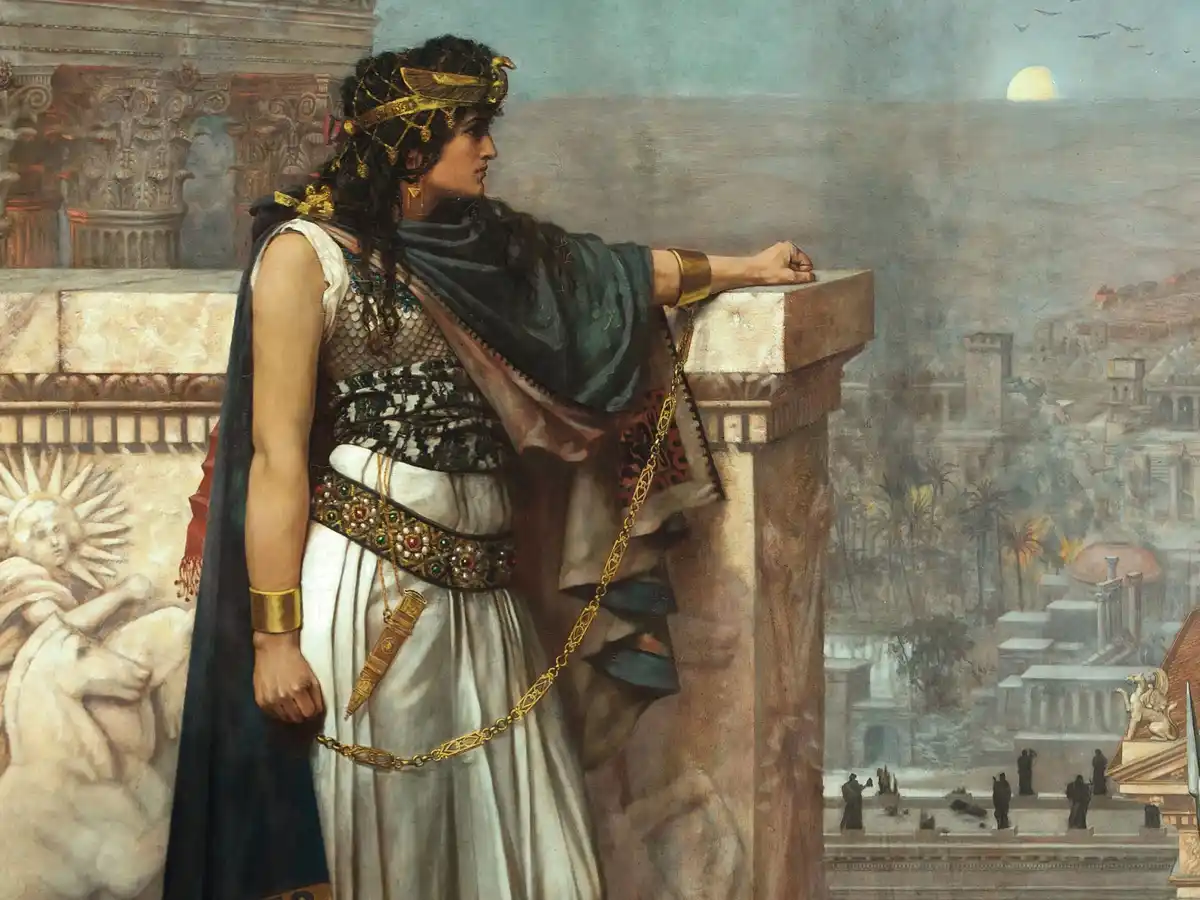 A classical painting depicts a regal woman in ornate ancient Egyptian-style attire, leaning on a stone parapet and gazing…