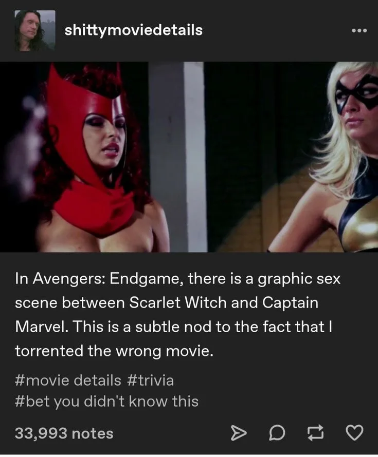The image shows two female superheroes, one in a red hooded costume and the other in a black and gold costume, standing side…