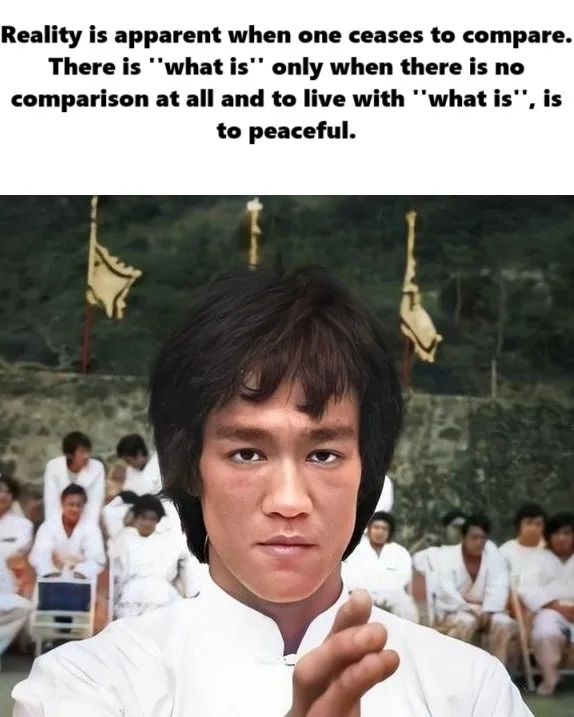 The image features Bruce Lee in a white martial arts uniform, looking intensely at the camera with a serious expression, his…