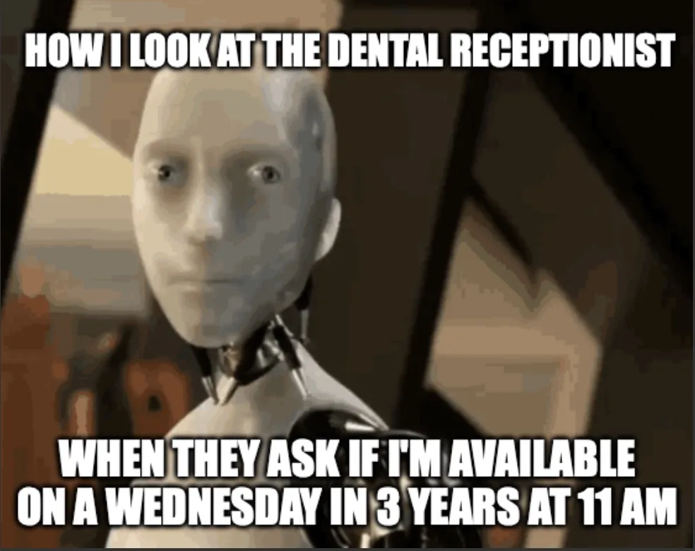 The image shows a close-up of a bald, robotic-looking character with a blank, unblinking stare, likely from a movie or show…