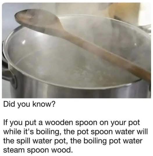 A photo of a wooden spoon resting across the rim of a large metal pot filled with boiling water, steam rising from the…