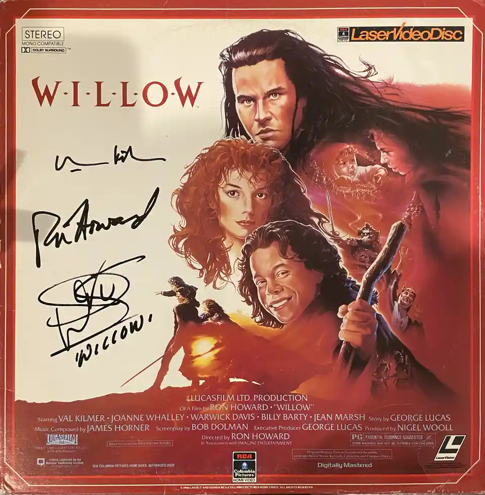 This is the cover art for the 1988 LaserDisc release of the fantasy film 'Willow', featuring a painted illustration of the…