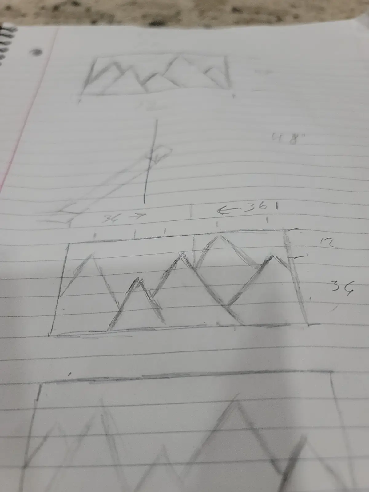 A close-up of a lined notebook page with several hand-drawn sketches of mountain ranges, each with measurements written next…