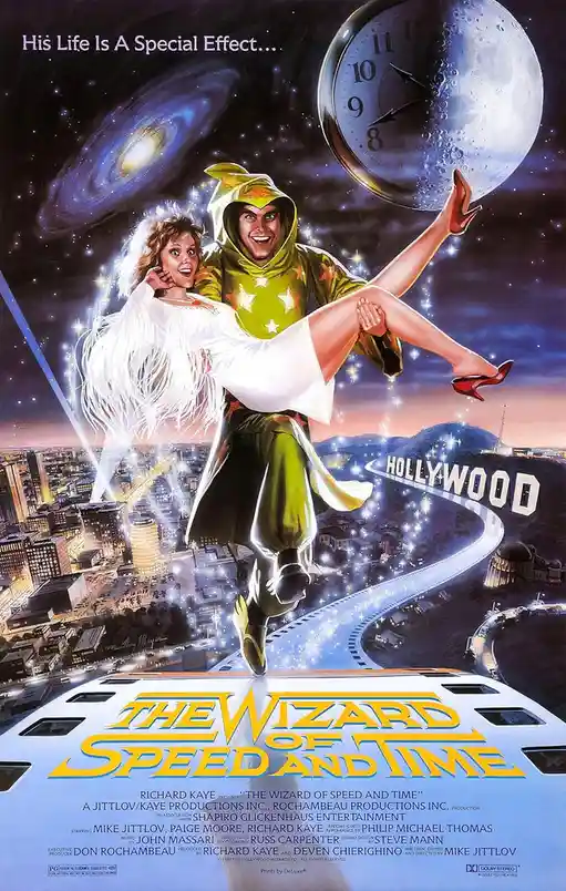 A movie poster for 'The Wizard of Speed and Time' shows a man in a green star-patterned hoodie carrying a woman in a white…