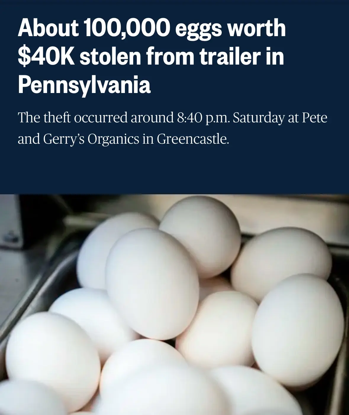 The image shows a close-up of many white eggs piled in a metal container. Overlaid text reports a theft of about 100,000…
