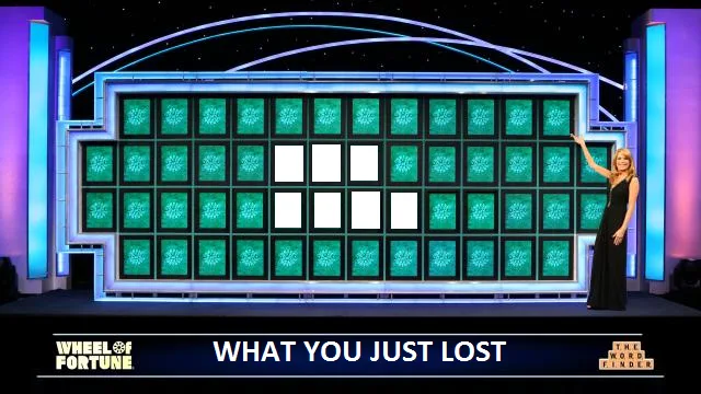 A woman in a black dress stands on a game show set next to a large grid of green panels, some of which are blank white. The…