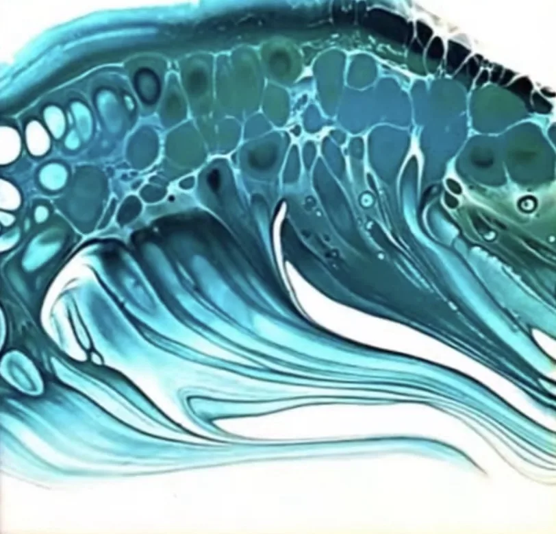 An abstract fluid art image with swirling teal, blue, and white paint patterns resembling ocean waves or cellular…