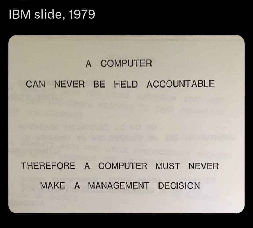 An image of a vintage IBM presentation slide from 1979, featuring bold, centered text stating that a computer can never be…