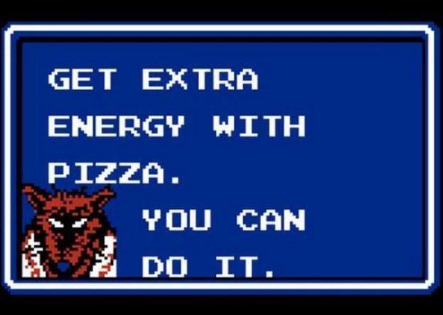 A pixelated blue screen with white text reads 'GET EXTRA ENERGY WITH PIZZA. YOU CAN DO IT.' A small, pixelated red fox-like…
