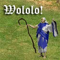 A character resembling a wizard or cleric from a video game, wearing a blue robe and holding a staff, stands on grass with…