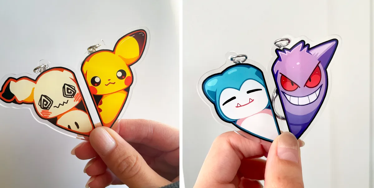 A side-by-side image shows a hand holding two sets of Pokémon-themed acrylic keychains. The left panel displays a keychain…