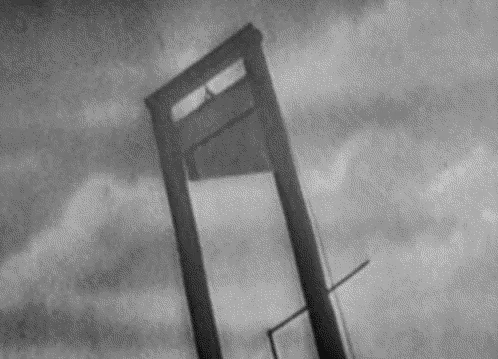 A black-and-white image shows a guillotine in six panels, with the blade progressively lowering in each frame. The overlaid…