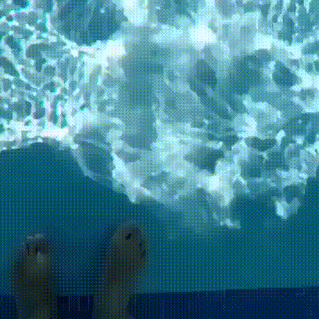 A composite image showing a person's feet and legs from a first-person perspective, transitioning from standing in shallow…