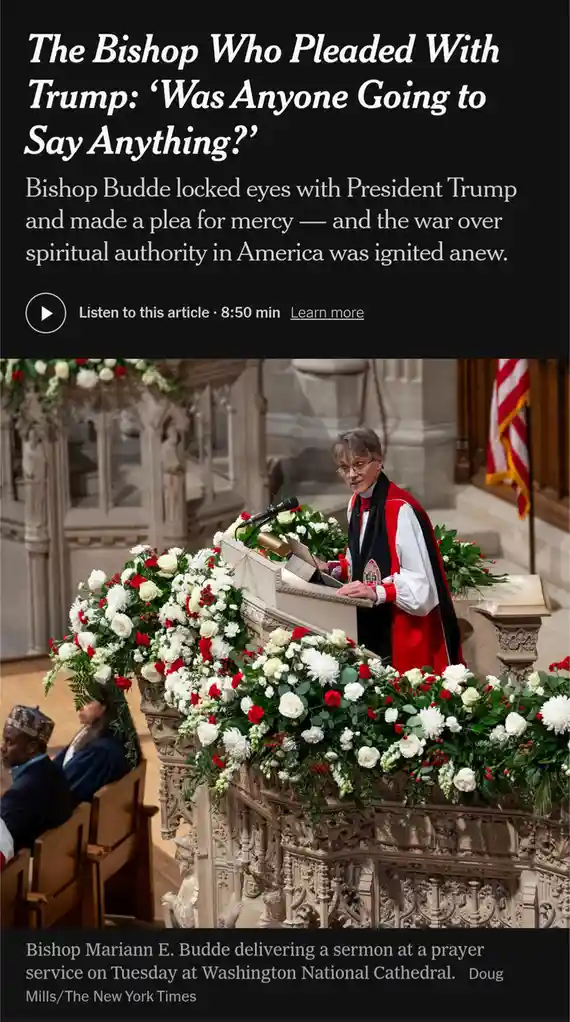A woman in red and black clerical robes stands at an ornate, flower-adorned pulpit inside a cathedral, appearing to deliver…