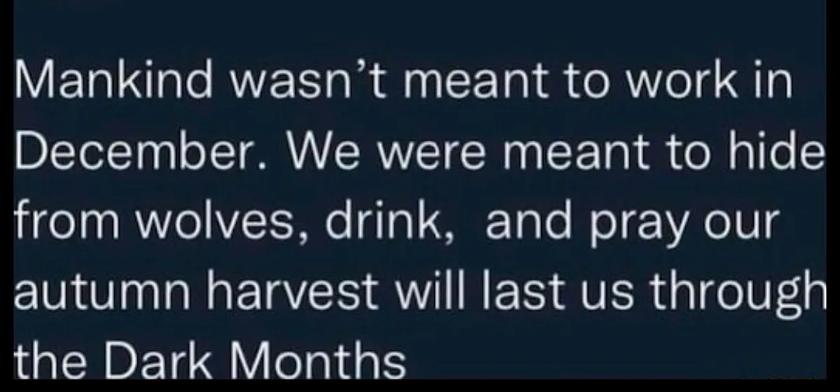 The image displays white text on a dark background, stating that mankind wasn't meant to work in December, but rather to…
