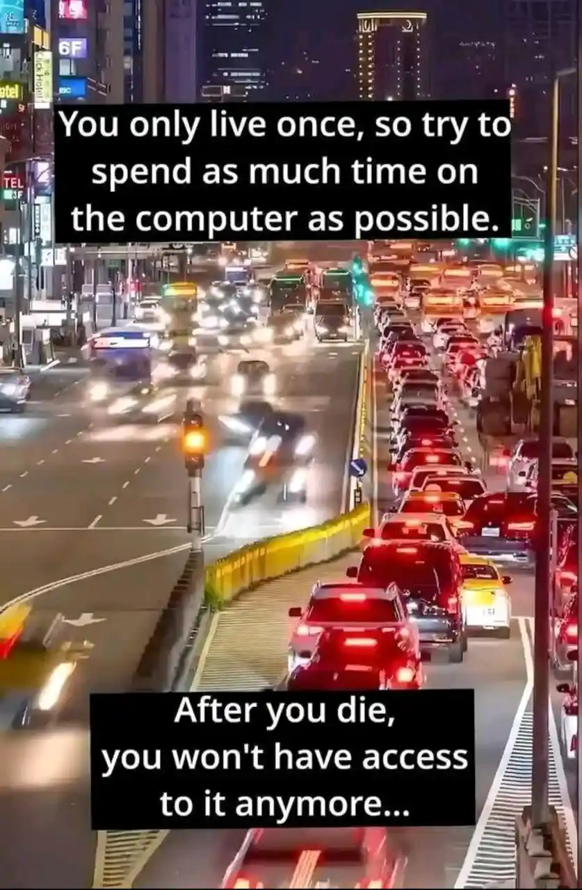 A nighttime city traffic scene shows heavy congestion with cars and motorcycles stuck in gridlock on a multi-lane road…
