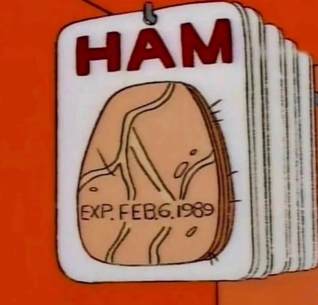 A cartoon-style food label with the word 'HAM' in red at the top, showing a drawing of a ham with an expiration date of…