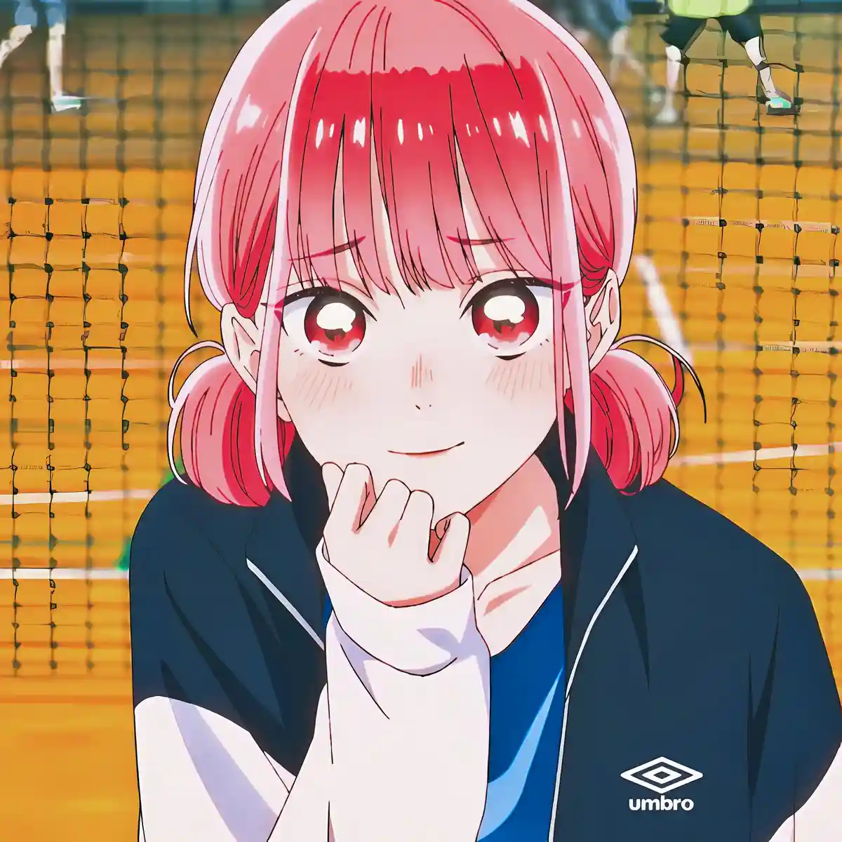An anime girl with pink hair and red eyes, wearing a dark blue Umbro sports jacket over a white shirt, stands in front of a…