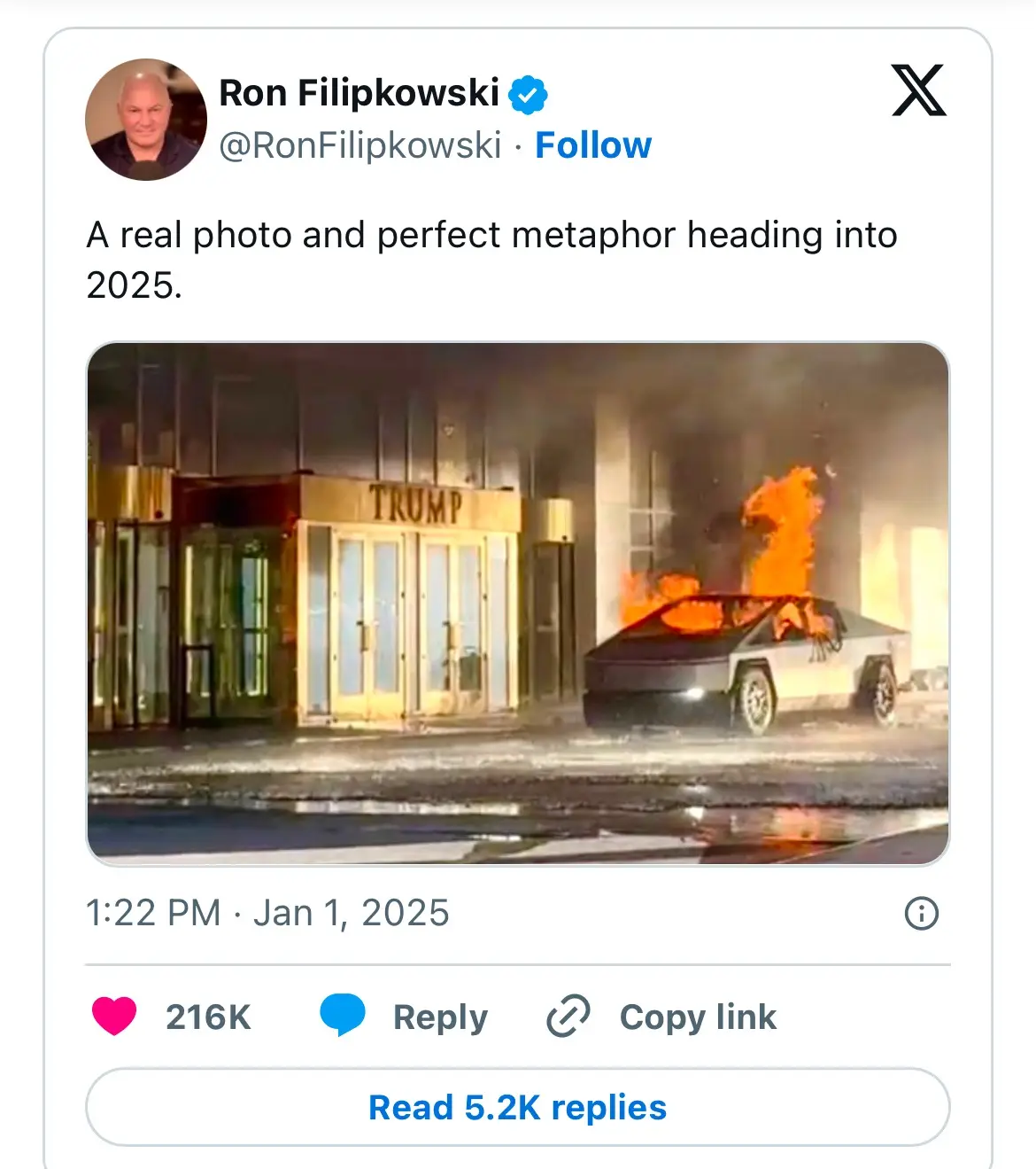 A screenshot of a tweet from Ron Filipkowski dated Jan 1, 2025, showing a photo of a burning Tesla Cybertruck parked outside…