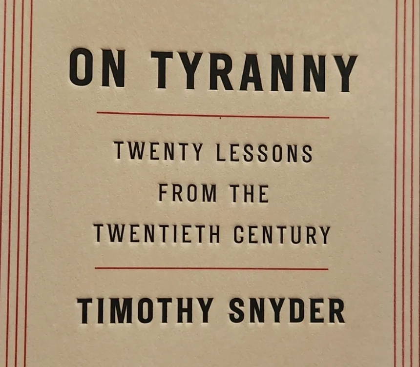 The image shows the book cover of 'On Tyranny: Twenty Lessons from the Twentieth Century' by Timothy Snyder. The cover has a…