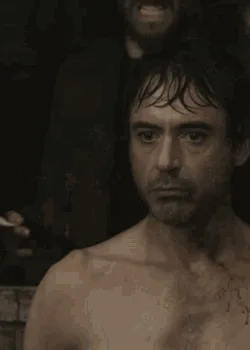 A six-panel image collage from the movie 'The Fighter' showing intense, gritty close-ups of actors in a boxing match…