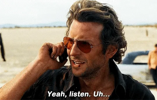 A six-panel image sequence shows actor Bradley Cooper on a phone call in a desert setting, with his expression shifting from…