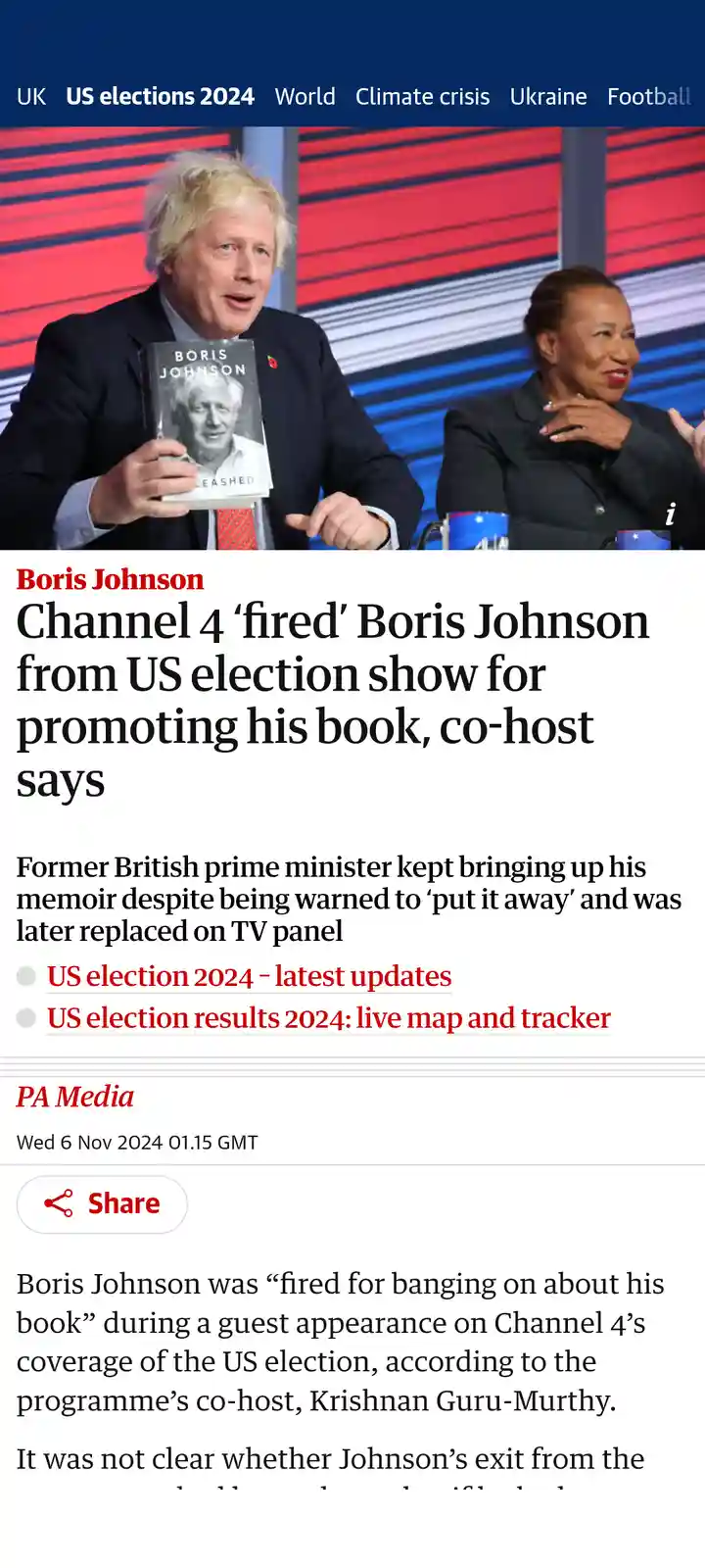 A screenshot of a news article shows Boris Johnson holding his book 'Unleashed' while seated on a TV panel, with a female…