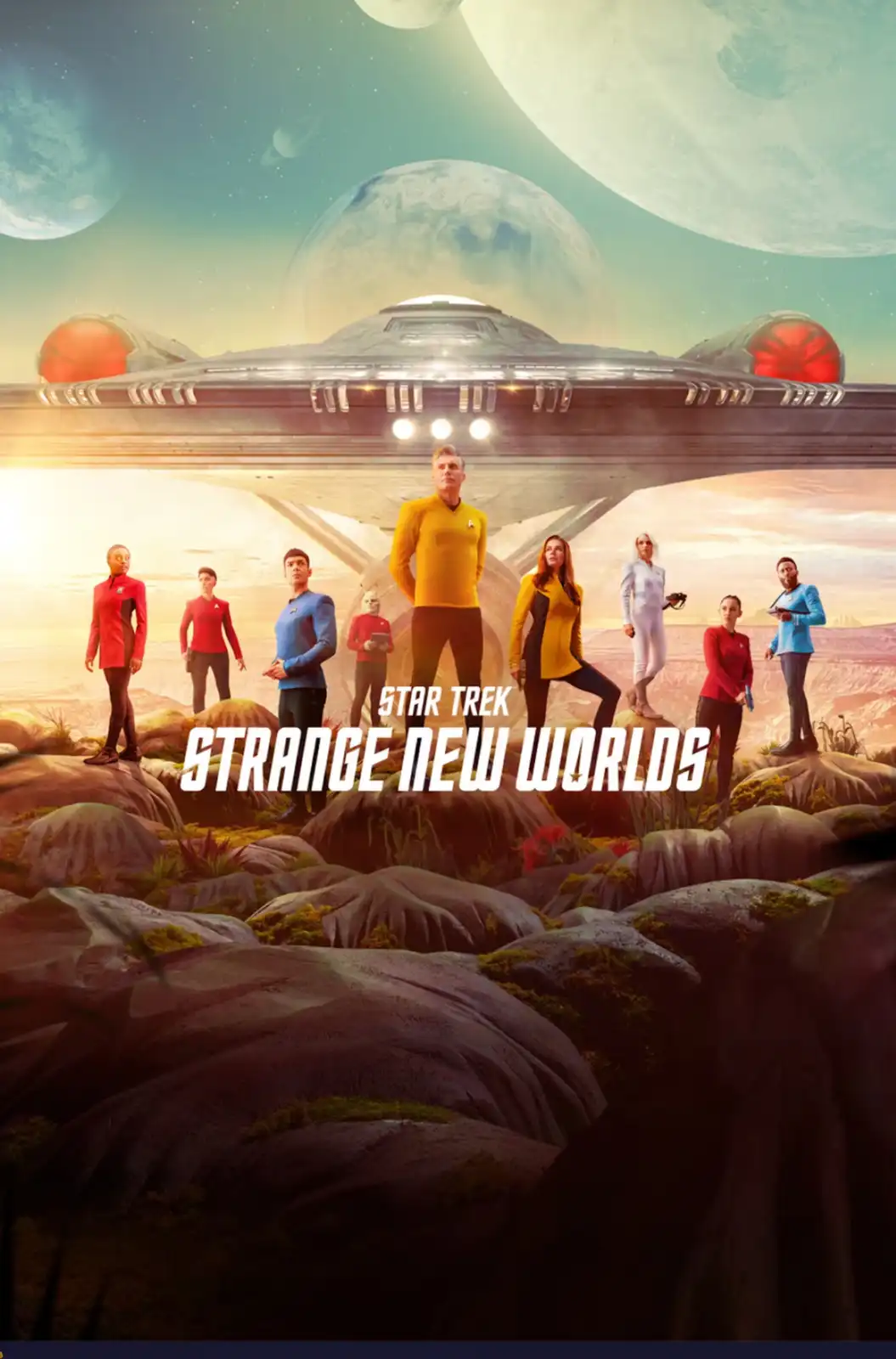 The promotional poster for the Star Trek series 'Strange New Worlds' shows the main cast standing on a rocky alien planet…