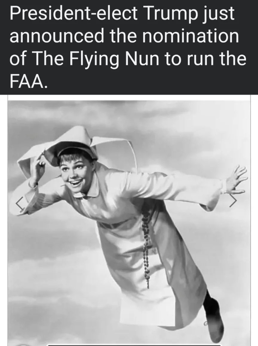 A black-and-white photo shows a smiling woman in a nun's habit flying through the clouds with her arms outstretched, wearing…