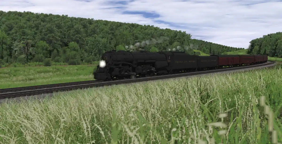 A black steam locomotive with 'NORTHLAND AND WESTERN' lettering pulls red passenger cars through a grassy field with…