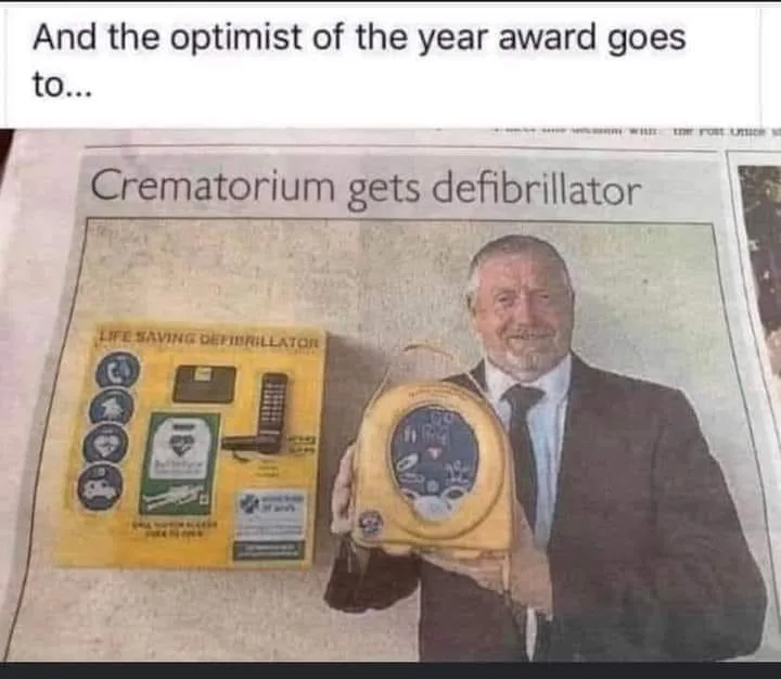 A newspaper clipping shows a man in a suit holding a yellow defibrillator, with a headline reading 'Crematorium gets…