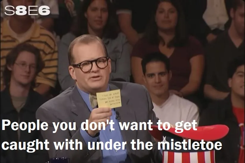 A man in glasses and a suit holds up a yellow card while sitting in an audience, with the overlaid text reading 'People you…