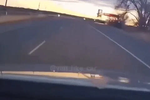 A six-panel car dashcam compilation shows a vehicle approaching a gas station, then suddenly rear-ending a large truck. The…