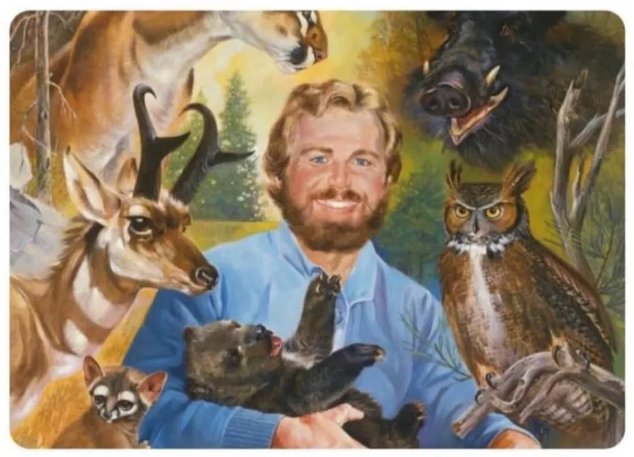 A painted portrait of a smiling man in a blue shirt holding a small bear cub, surrounded by various wild animals including a…
