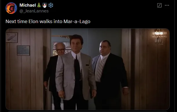 Three men in suits stand in a hallway, with the central man looking forward and the two flanking him looking sideways. The…