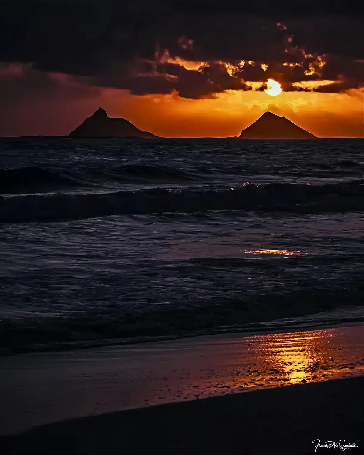 A Moody Sunset Over the Ocean with Golden Reflections