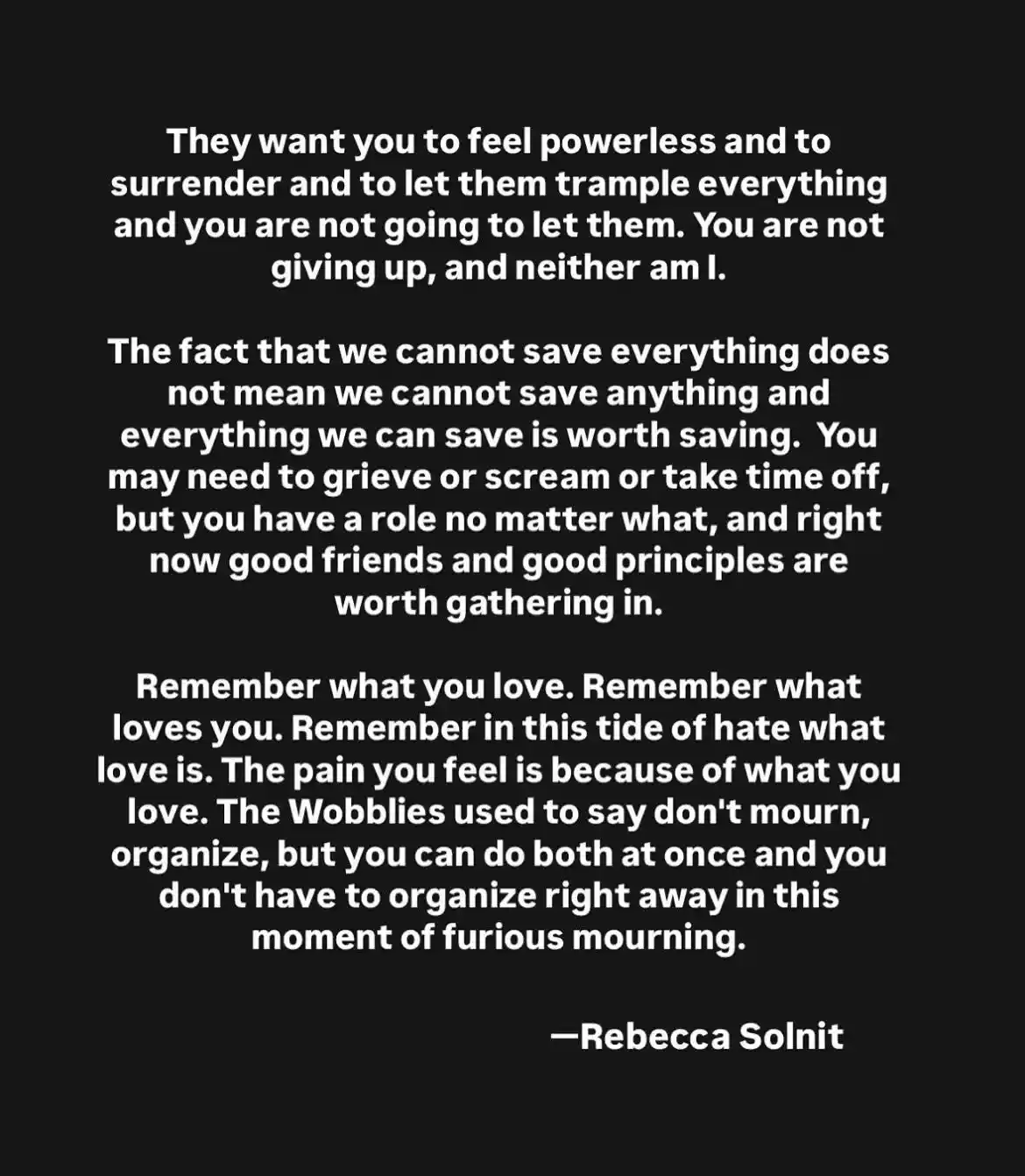 A black background with white text displaying a motivational quote by Rebecca Solnit, divided into three paragraphs. The…