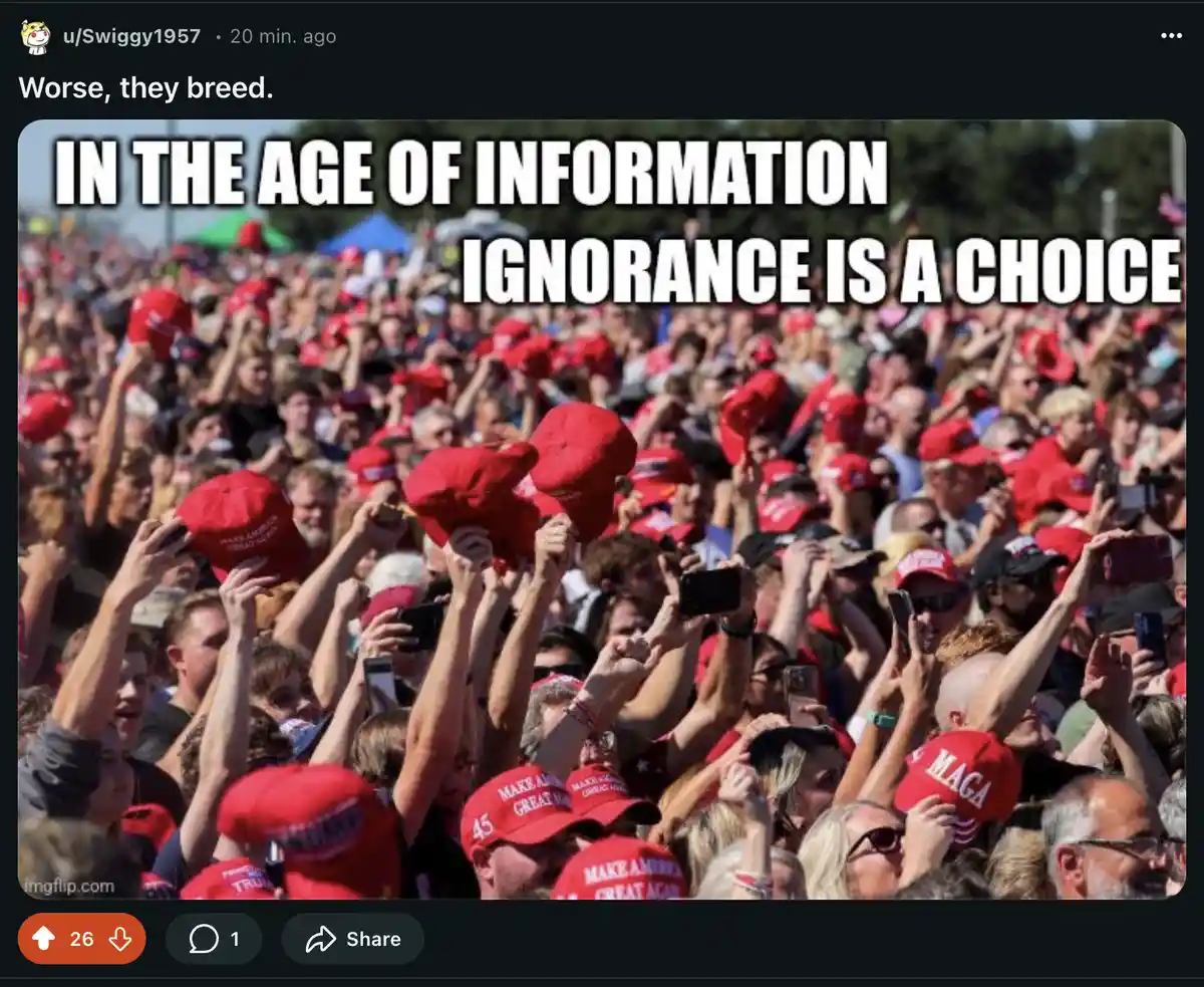 A large crowd of people, many wearing red 'Make America Great Again' hats, are shown at an outdoor rally with arms raised…