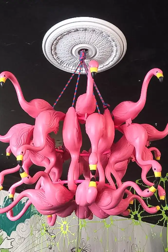 A Stylish Flamingo Adorned with a Medallion
