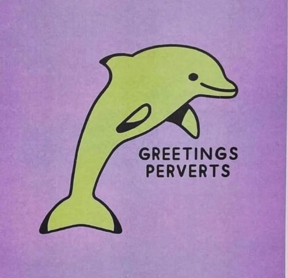 A simple cartoon-style green dolphin with a black outline is leaping against a solid purple background. Below the dolphin…