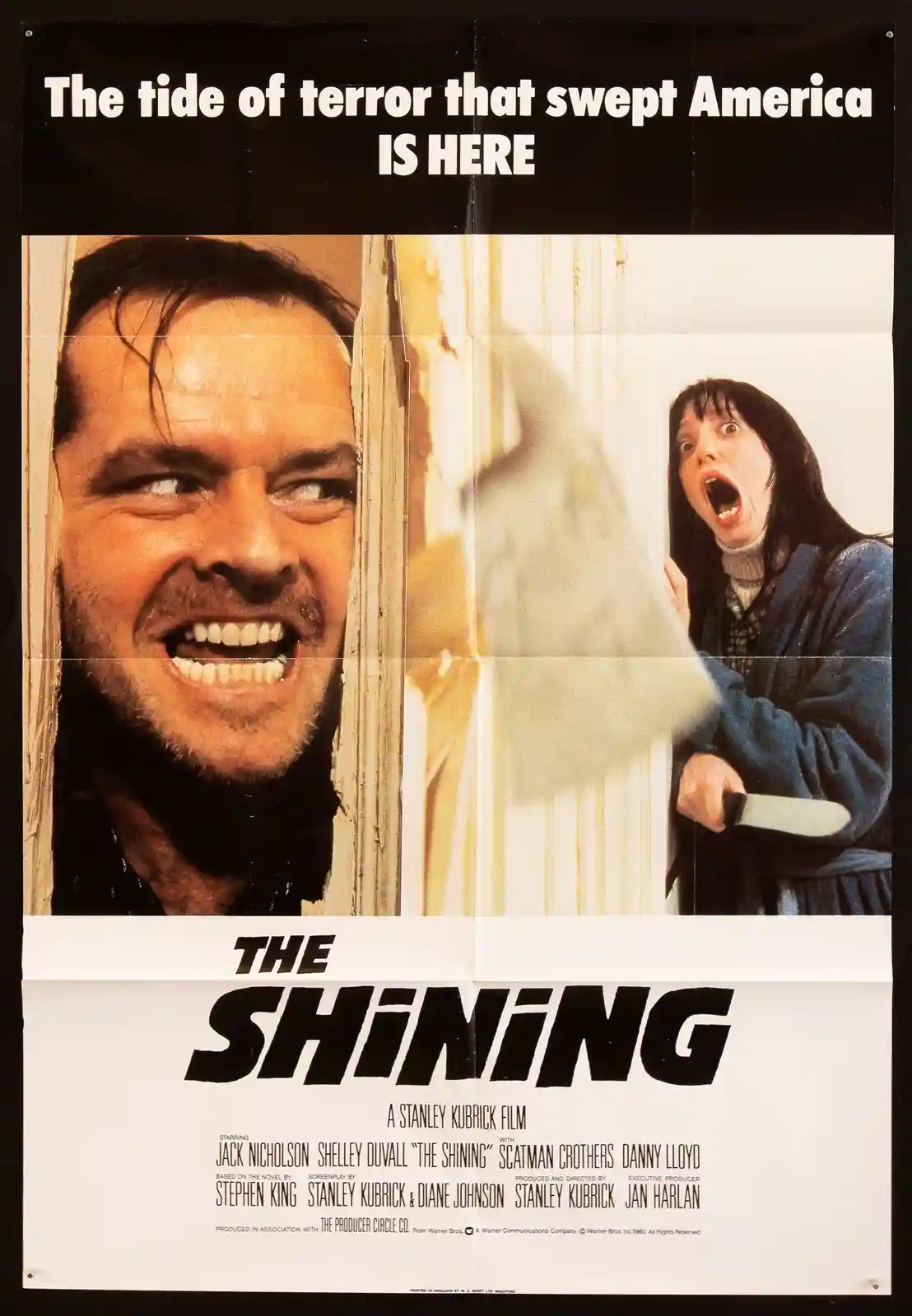 This is a vintage movie poster for 'The Shining,' featuring Jack Nicholson with a manic grin peering through a doorway, and…
