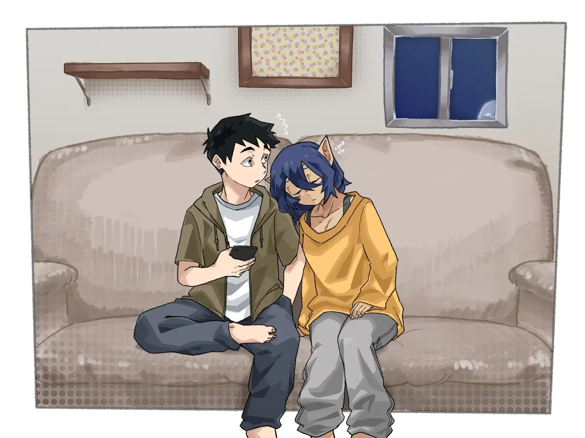 Two anime-style characters sit on a couch; one with black hair holds a phone and looks at the other, who has blue hair…