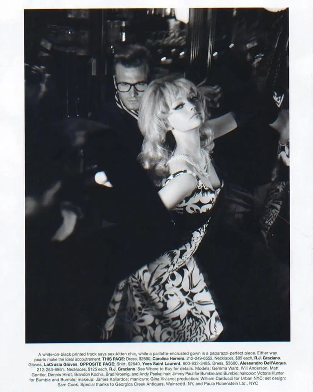 A black-and-white fashion photo shows a blonde woman in a patterned dress posing with her head tilted back, while a man in…