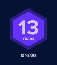 A dark blue background features a purple hexagon with the number '13' in large white font, and 'YEARS' in smaller white font…
