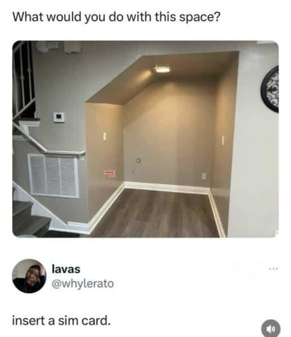 An empty, unfinished nook under a staircase with wood-look flooring, beige walls, and a visible vent. The overlaid text asks…