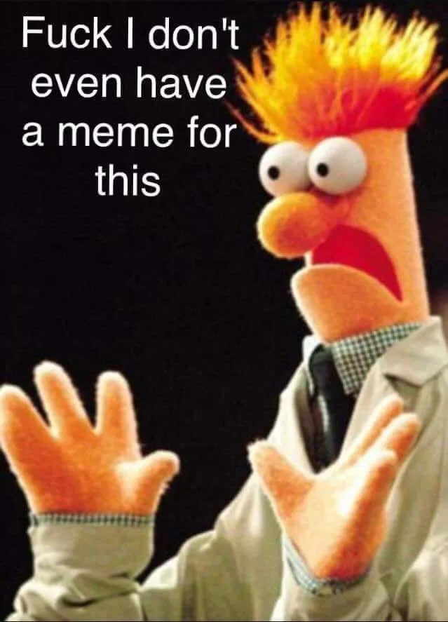The image shows the Muppet character Beaker with wide, shocked eyes and his hands raised in surrender or disbelief. He is…