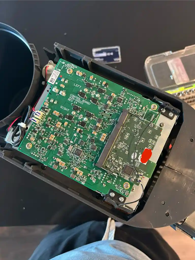 A close-up photo shows the internal green circuit board of a device, labeled 'CONTROL BOARD 625-00022 REV 14', with 'LEFT'…