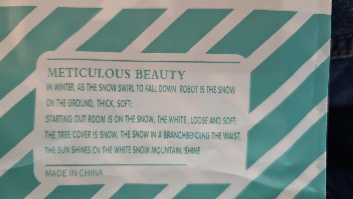 A close-up of a product's packaging with teal and white diagonal stripes. The text, styled like a poem, describes a winter…